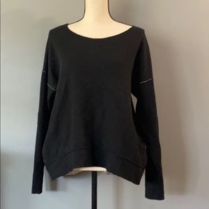 Reversible sweater with pockets